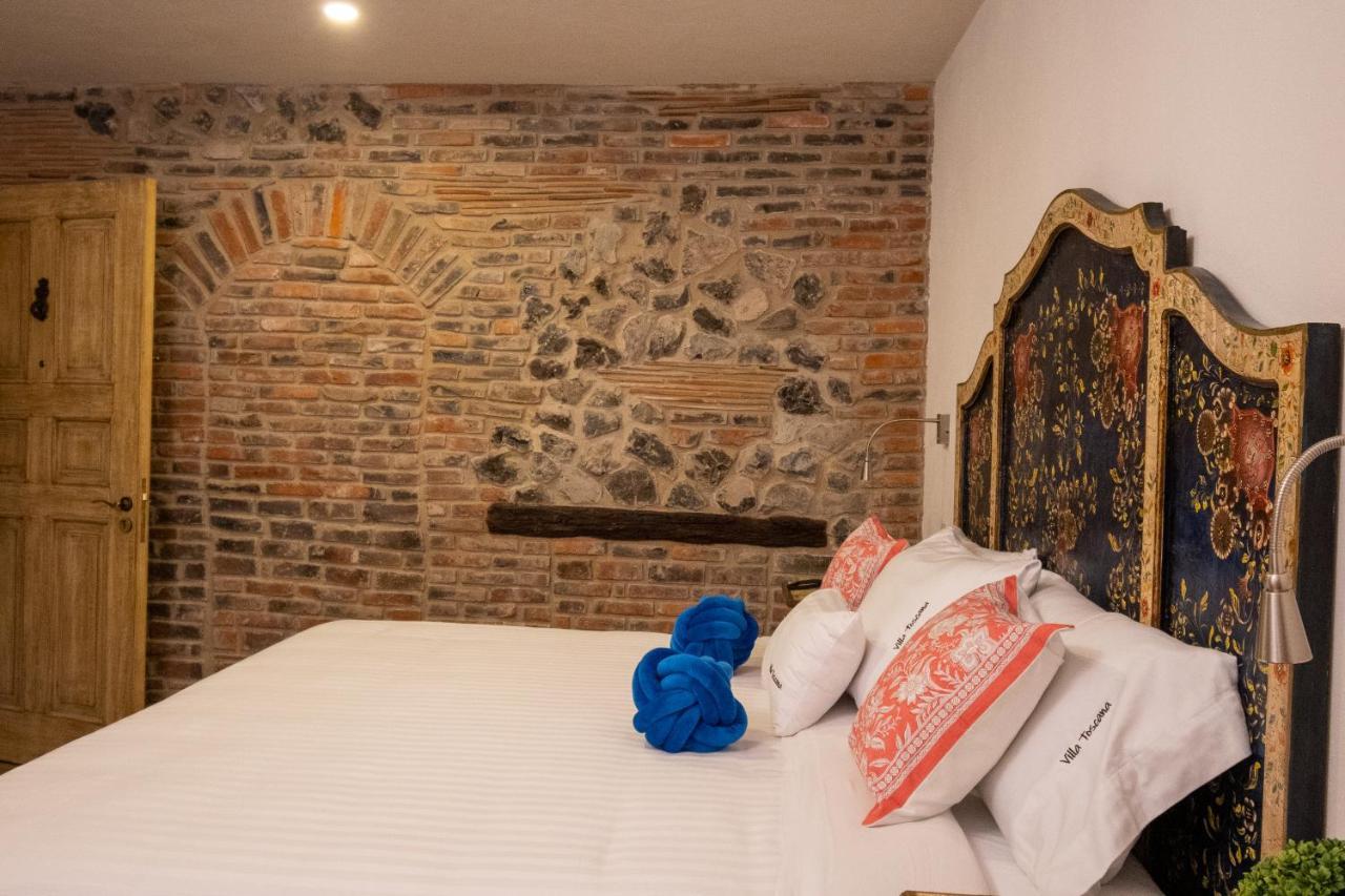 Villa Toscana Valquirico Lofts & Suites Hotel Boutique Santeagueda エクステリア 写真